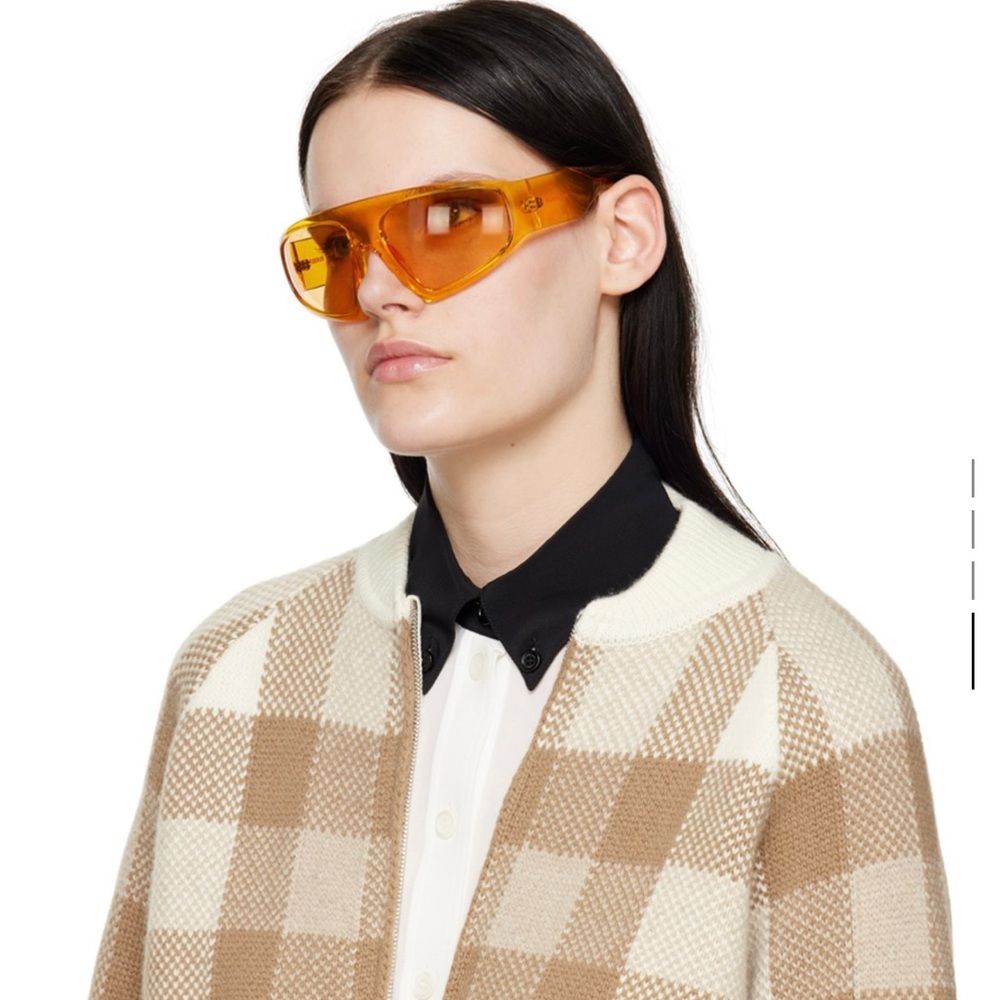 Shield-style transparent acetate-frame sunglasses in orange. Made in Italy